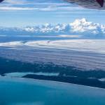 Photo by Martin Truffer
The 18,008-foot Mount St. Elias rises above Malaspina Glacier and Sitkagi Lagoon (water body center left) in 2021.