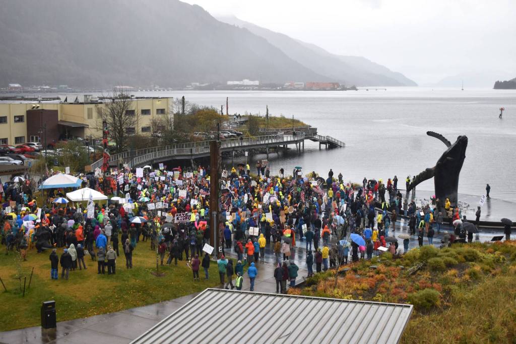 Protesters trickled in and out of the Saturday, Oct. 18, at No Tsars, No Kings protest at Overstreet Park, though event organizers estimated up to 2,000 people attended the event. (Mari Kanagy/Juneau Empire)