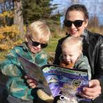 Alaska Childrens Trust photo
Oliva, River, and Oliver Jenkins read the online safety comic produced by the Alaska Childrens Trust.