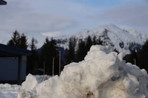 A snow pile sits outside Thunder Mountain Middle School. Juneau School District has cancelled school Friday Jan. 9, due to hazardous road and weather conditions as an atmospheric river arrives. (Clarise Larson / Juneau Empire file photo)