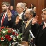 State Sens. Jesse Bjorkman (R-Nikiski), Matt Claman (D-Anchorage), Jesse Kiehl (D-Juneau) and Sen. James Kaufman (R-Anchorage) are sworn in by Lt. Gov. Nancy Dahlstrom during the opening day of the 34th Alaska State Legislature on Tuesday at the Alaska State Capitol. (Mark Sabbatini / Juneau Empire file photo)