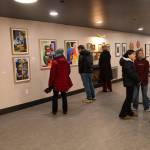Dozens of people attended the opening of Gestures of Our Rebel Bodies, a group exhibition by seven Indigenous artists, at Aan Hít in downtown Juneau on Saturday, Jan. 24. (Chloe Anderson/Juneau Empire)