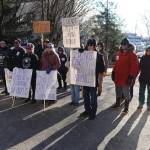 Protesters gather outside before Sullivan arrives at the capitol.