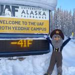 Photo courtesy Ned Rozell
Alaska Goldpanners baseball team mascot Happy Boy (aka Chris Carlson of Fairbanks) poses in front of the University of Alaska Fairbanks temperature sign on the morning of March 1, 2026.
