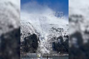 The mountain above Thane Road at 11:40 a.m. on March 24, 2026. Thane Road, at the avalanche gates, is closed overnight with re-evaluation planned for Wednesday morning, March 25. (Alaska Department of Transportation/Facebook)